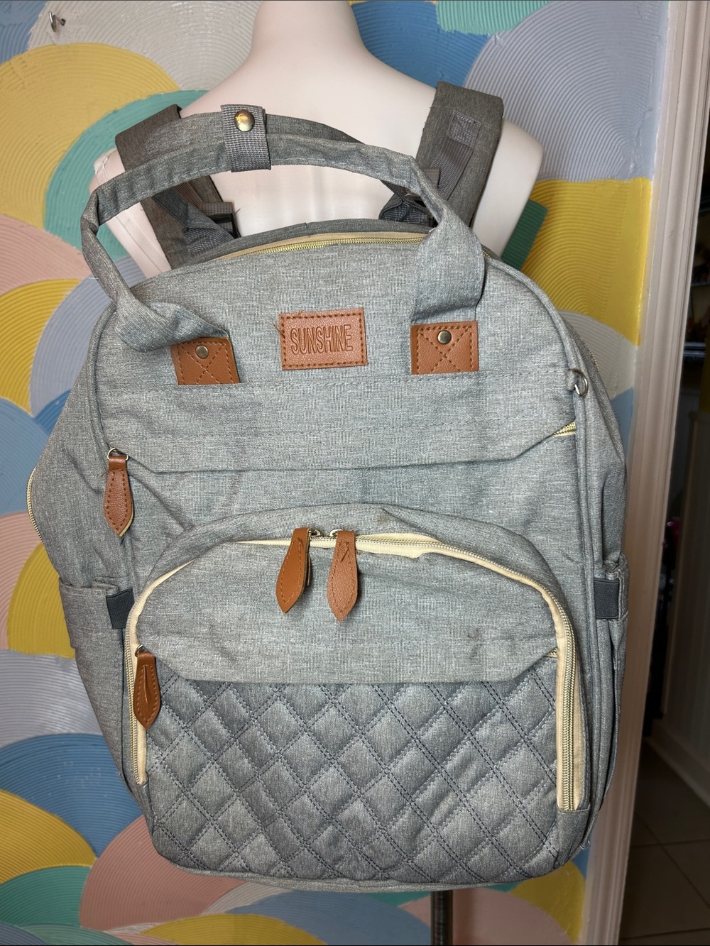 Sunshine Diaper Bag Gray Quilted with Leather Accents fold out into bed